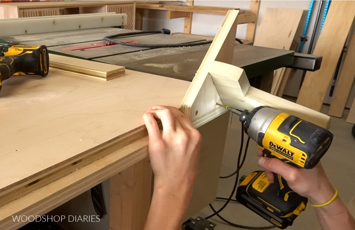 Screw foot plates to headboard bottom