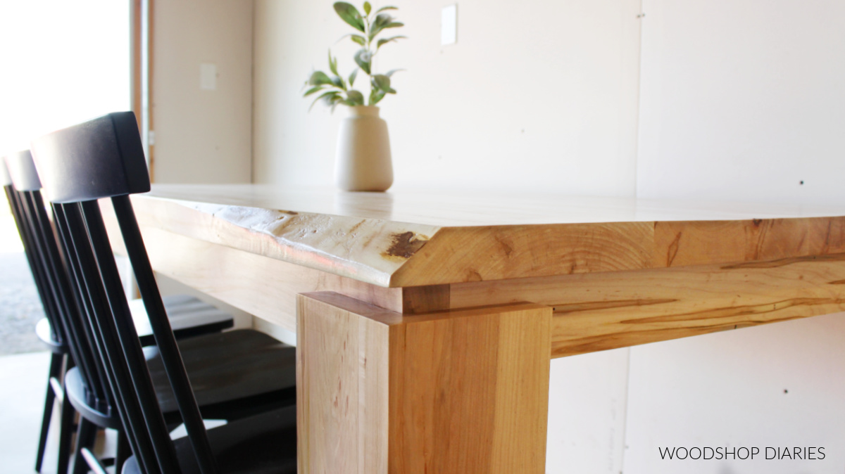 Close up of live edge corner of modern DIY dining table