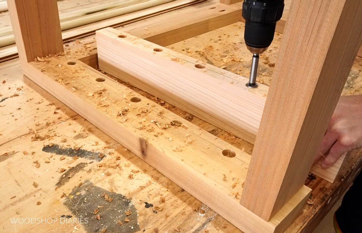 Using a forstner bit to drill out dowel holes in outdoor chair seat frame wood pieces