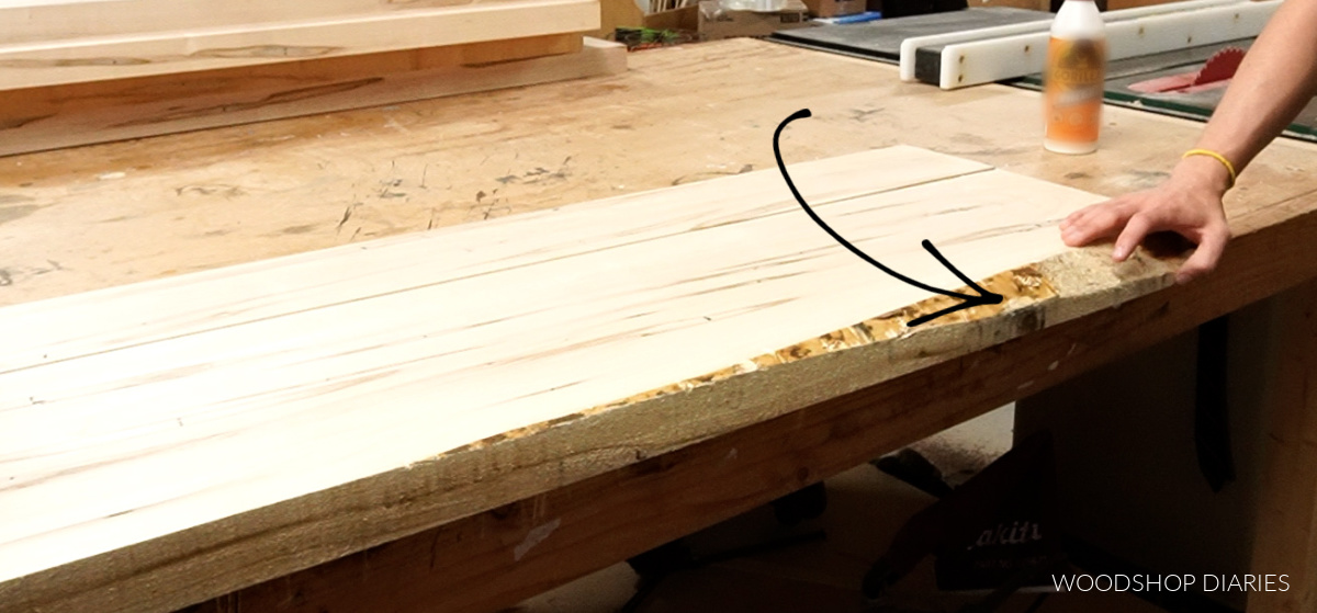 Live rough edge on one maple board of table top