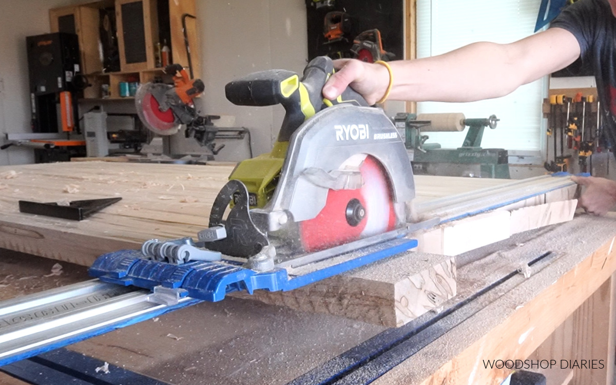 Using a circular saw to trim table top edges on workbench