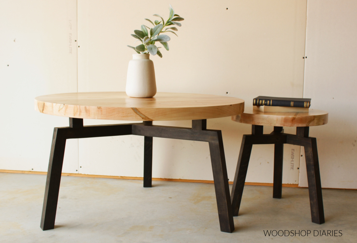 Big and small black and wood modern DIY round coffee tables together with floating top