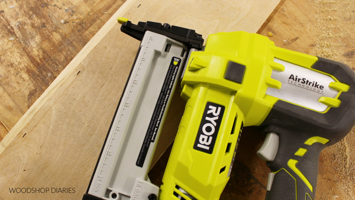 Ryobi AirStrike crown stapler showing staples used to secure ¼" plywood to wood boards