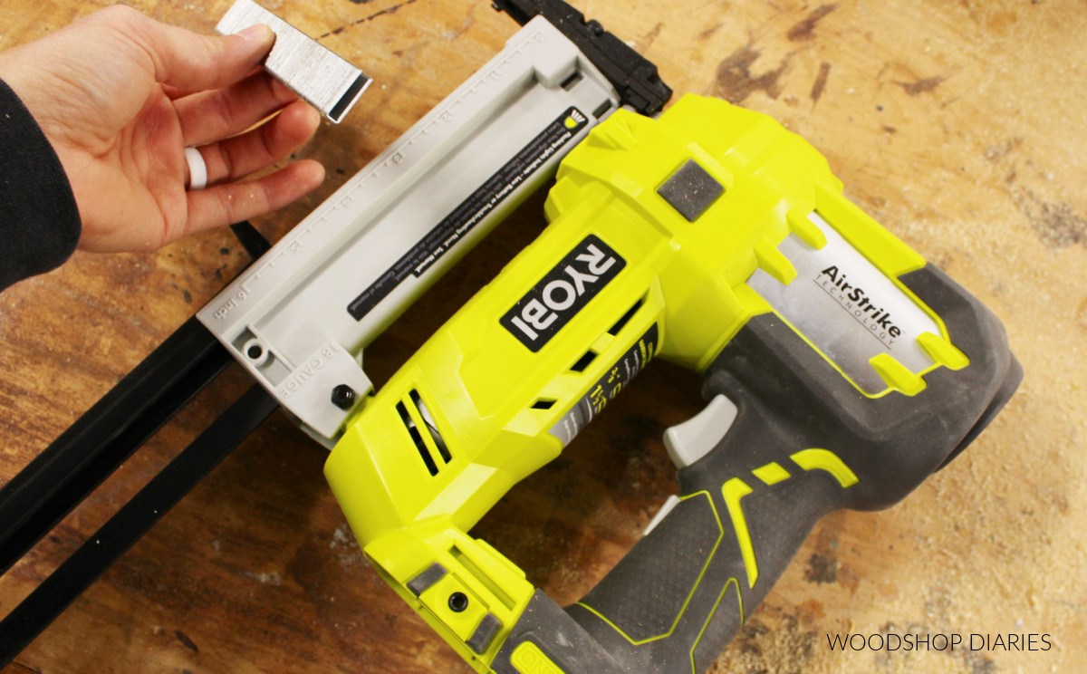 Close up of Ryobi AirStrike crown stapler with staples