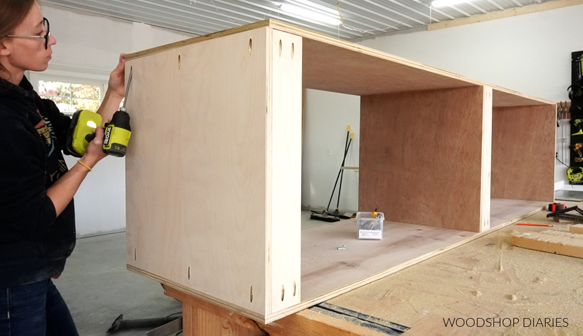 Shara Woodshop Diaries assembling pantry cabinet on workbench using pocket holes and screws