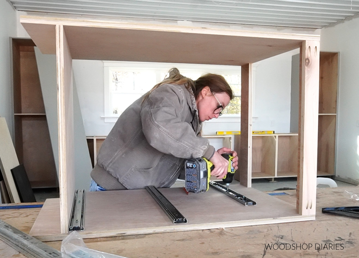 Shara Woodshop Diaries installing drawer slides into base cabinet