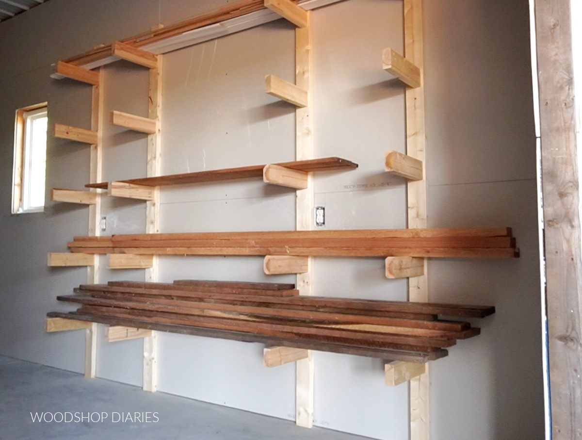 Easy DIY lumber rack loaded up with walnut, cedar, and trim pieces