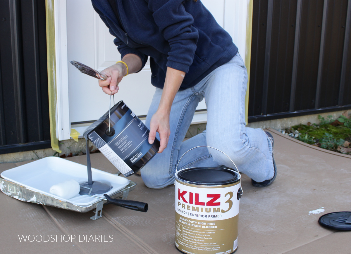 Shara Woodshop Diaries pouring paint into paint tray