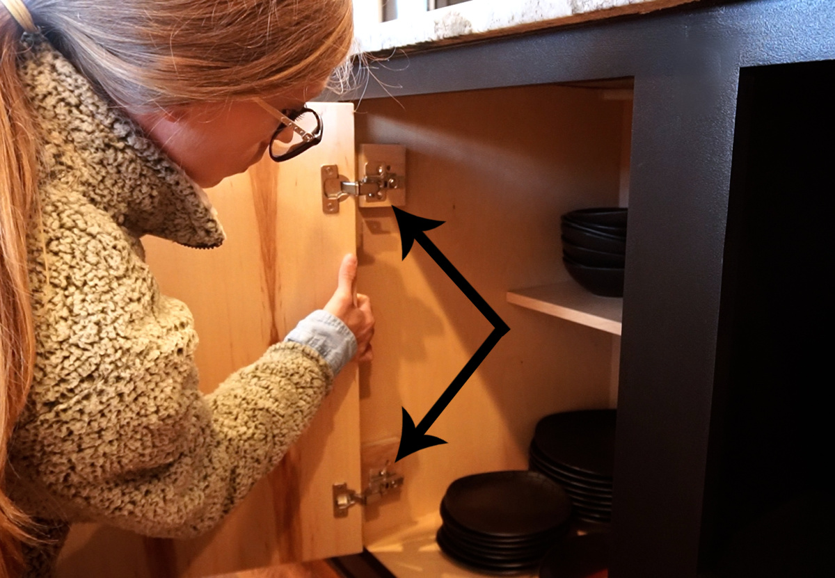 Shara Woodshop Diaries installing inset cabinet door onto spacer blocks