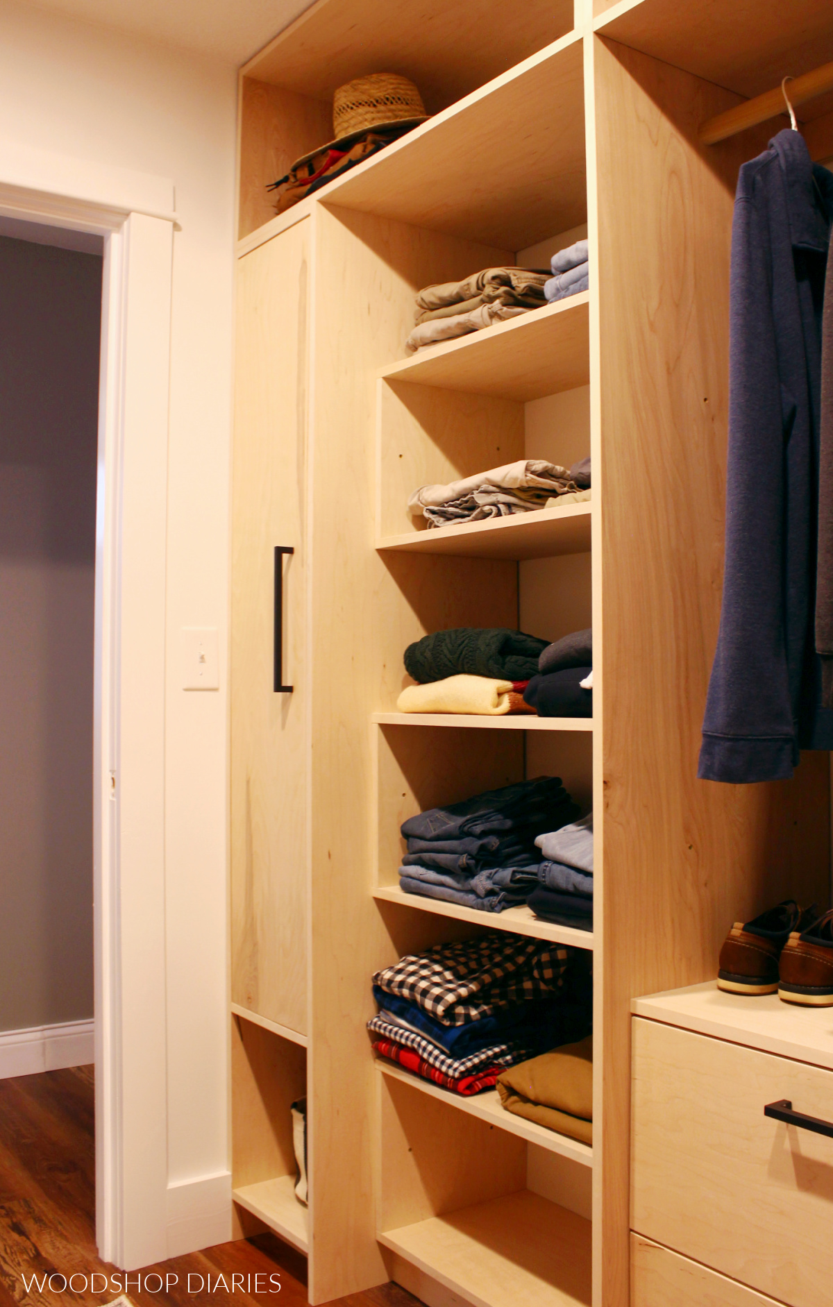 Tall pantry closet cabinet built in with open shelves above and beside