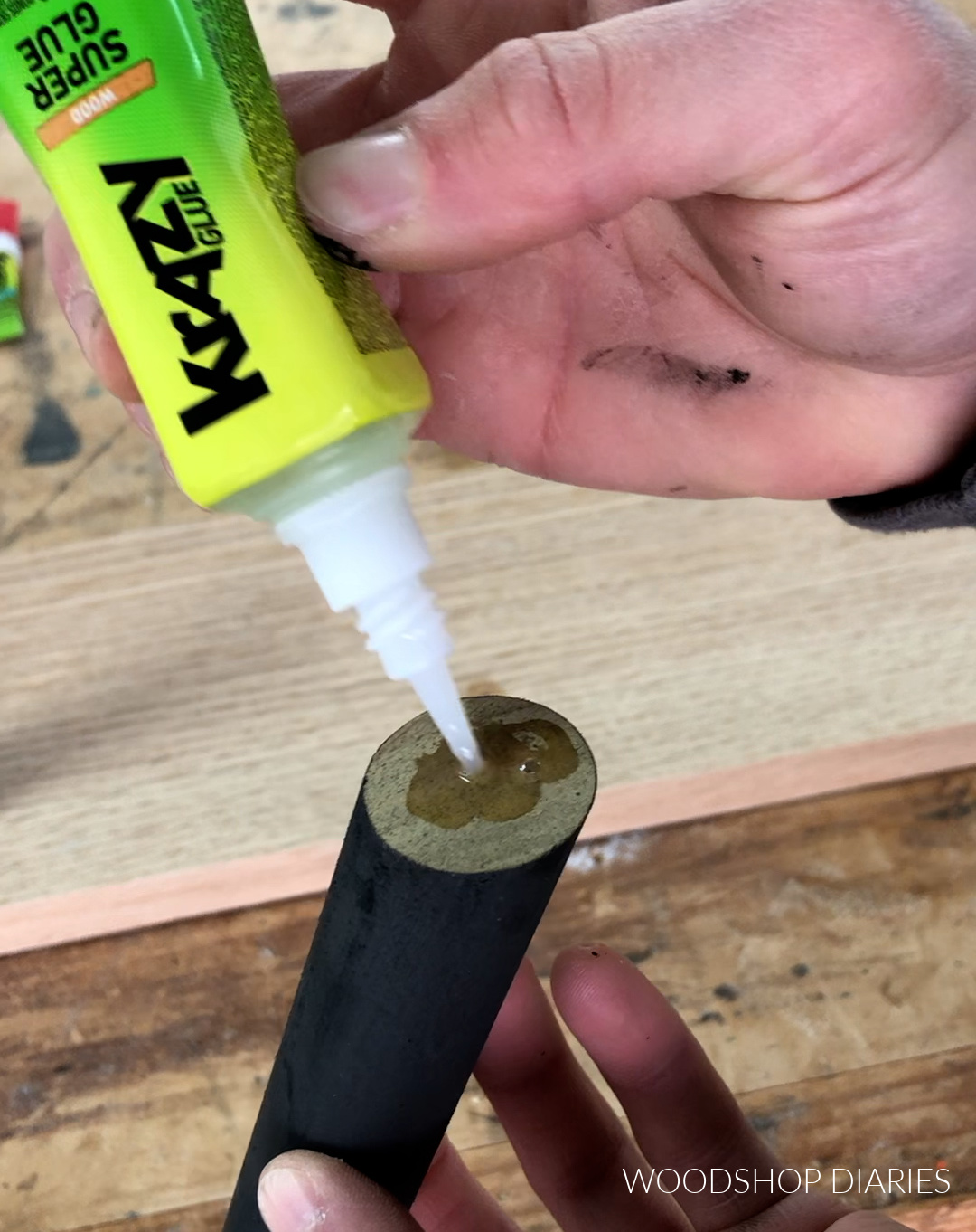 Using Krazy glue to attach pegs to rack board