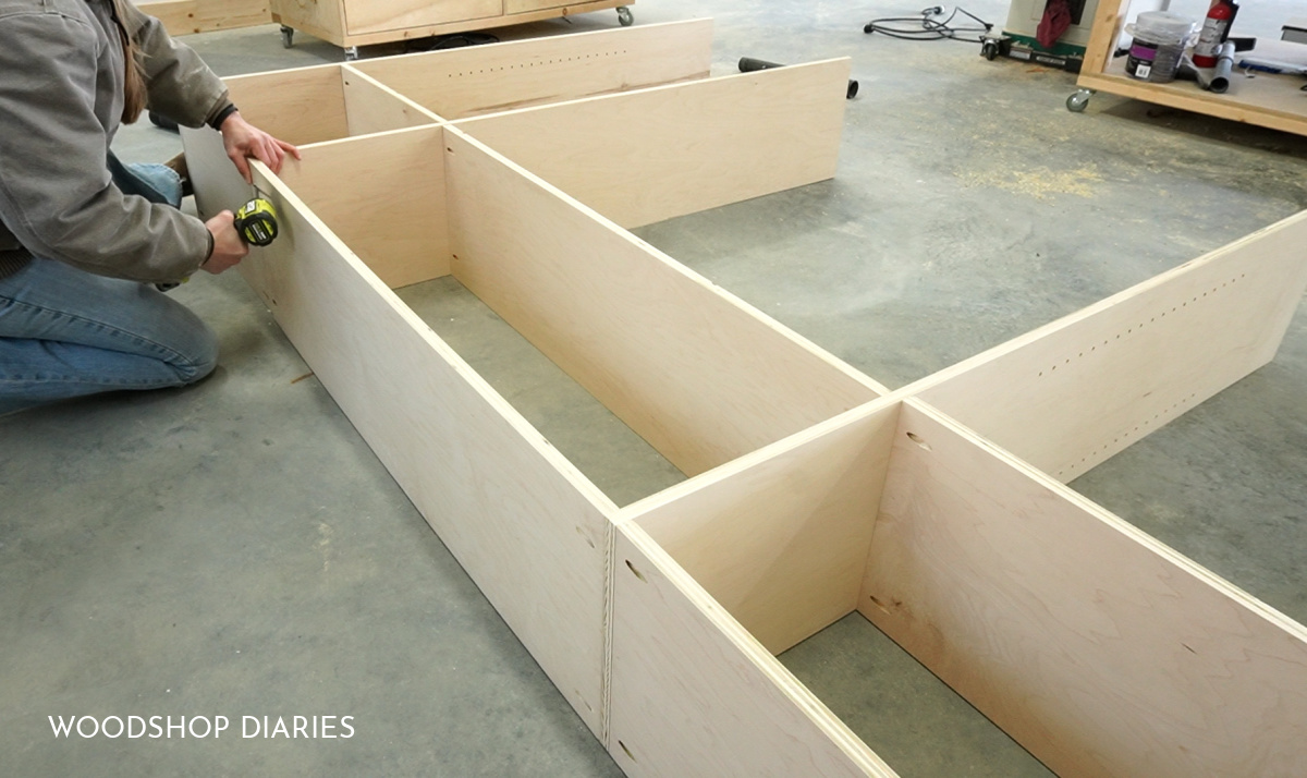 Shara Woodshop Diaries using pocket holes to assemble middle section of library bookshelves