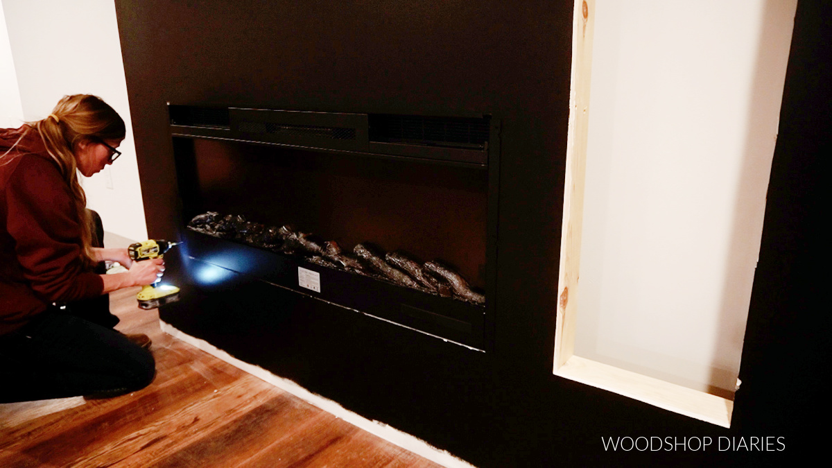 Shara Woodshop Diaries installing electric fireplace into wall