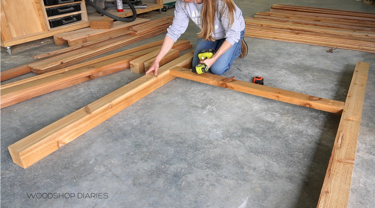 Shara Woodshop Diaries assembling arbor frame on concrete floor