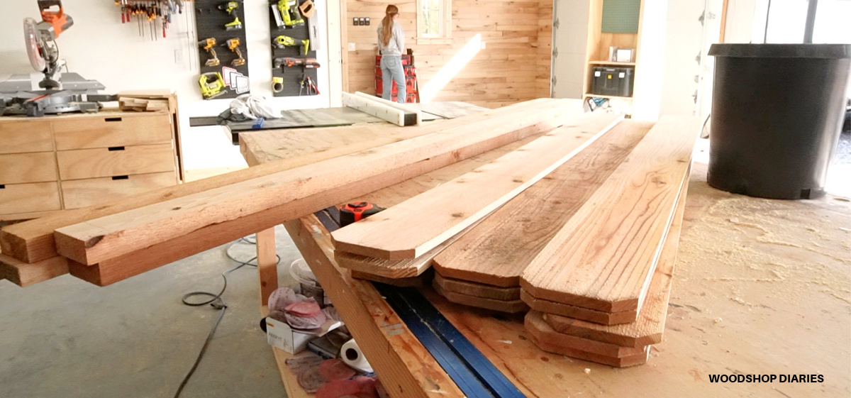 Cedar 2x4s and fence pickets on workbench