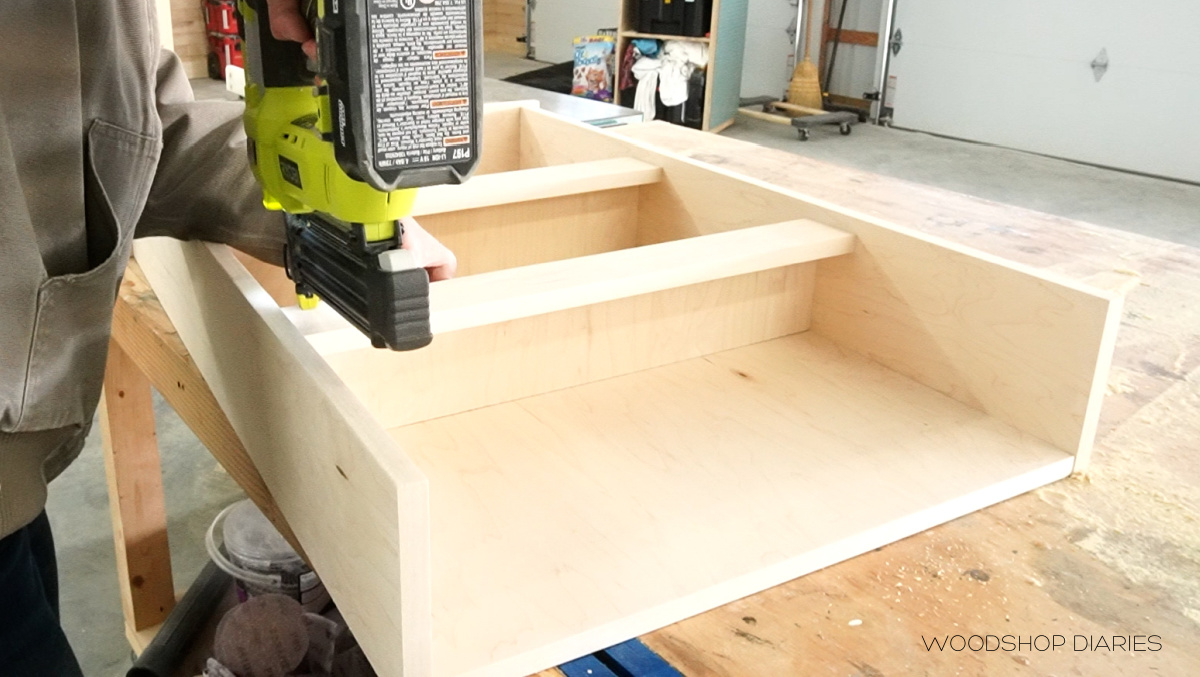 Brad nailer securing shelf fronts onto book/shoe rack project