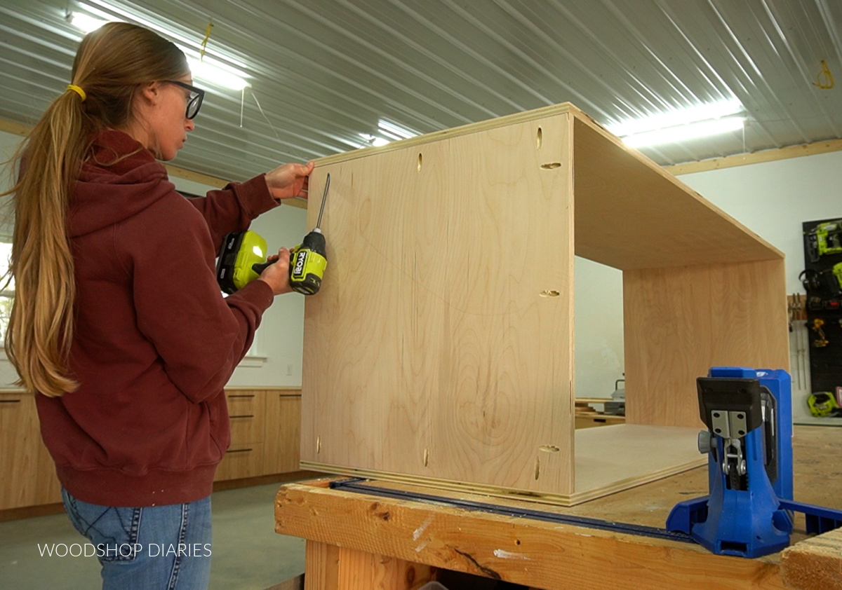 Shara Woodshop Diaries assembling plywood box on workbench using pocket holes