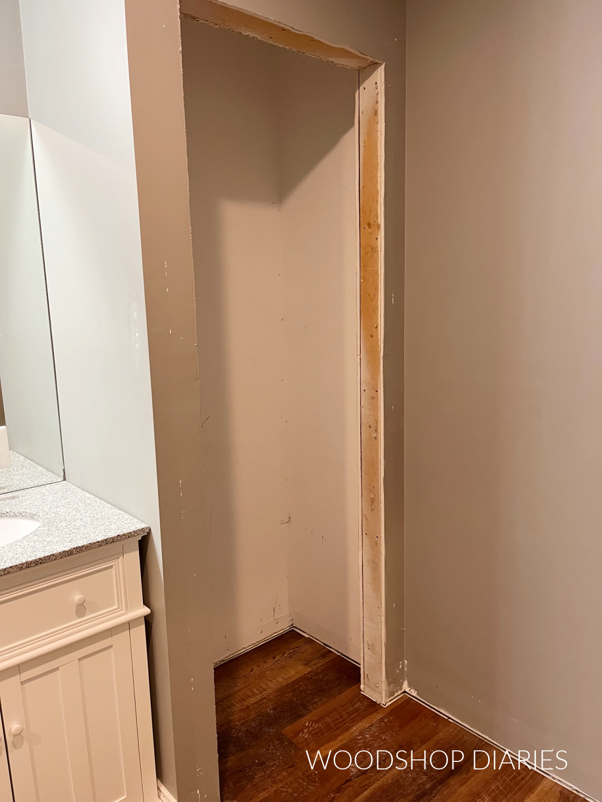 Closet door frame with door and trim removed