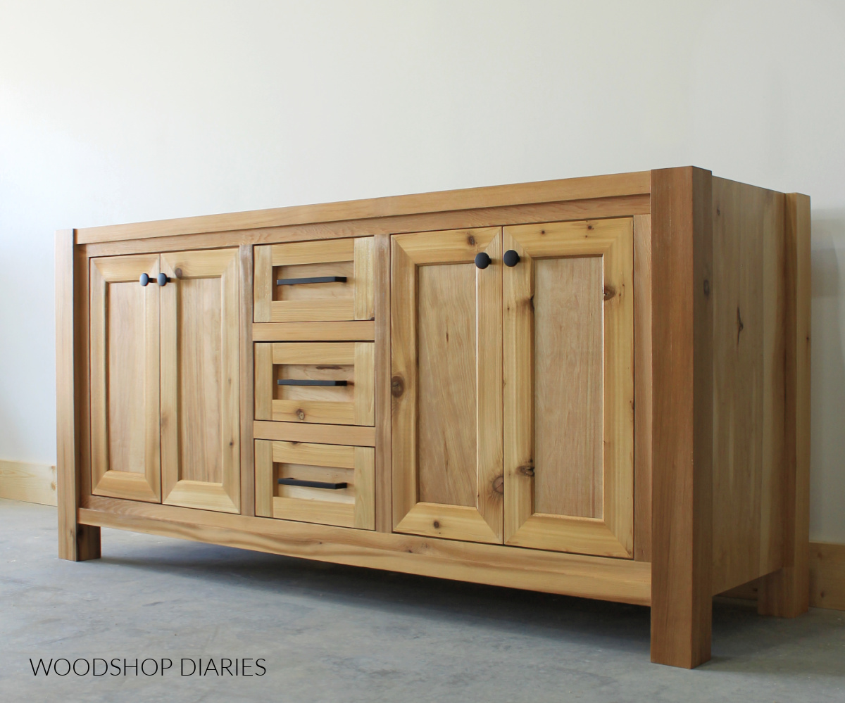 DIY cedar bathroom vanity against white wall