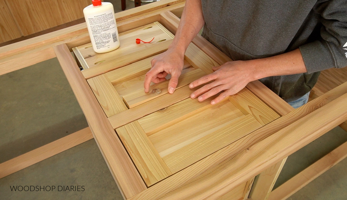 Shara Woodshop Diaries gluing 1x3s around  bathroom vanity drawer boxes