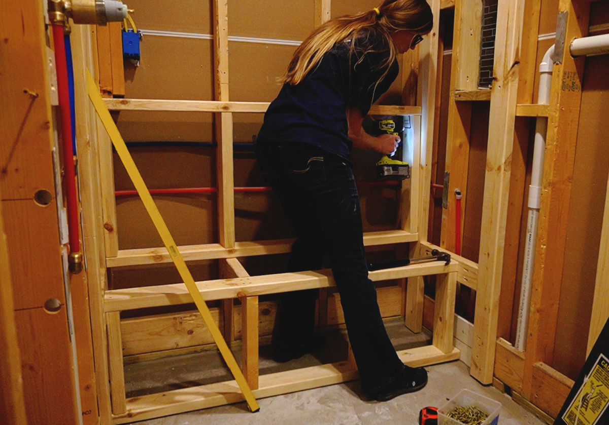 Shara Woodshop Diaries framing out false walls in back of shower