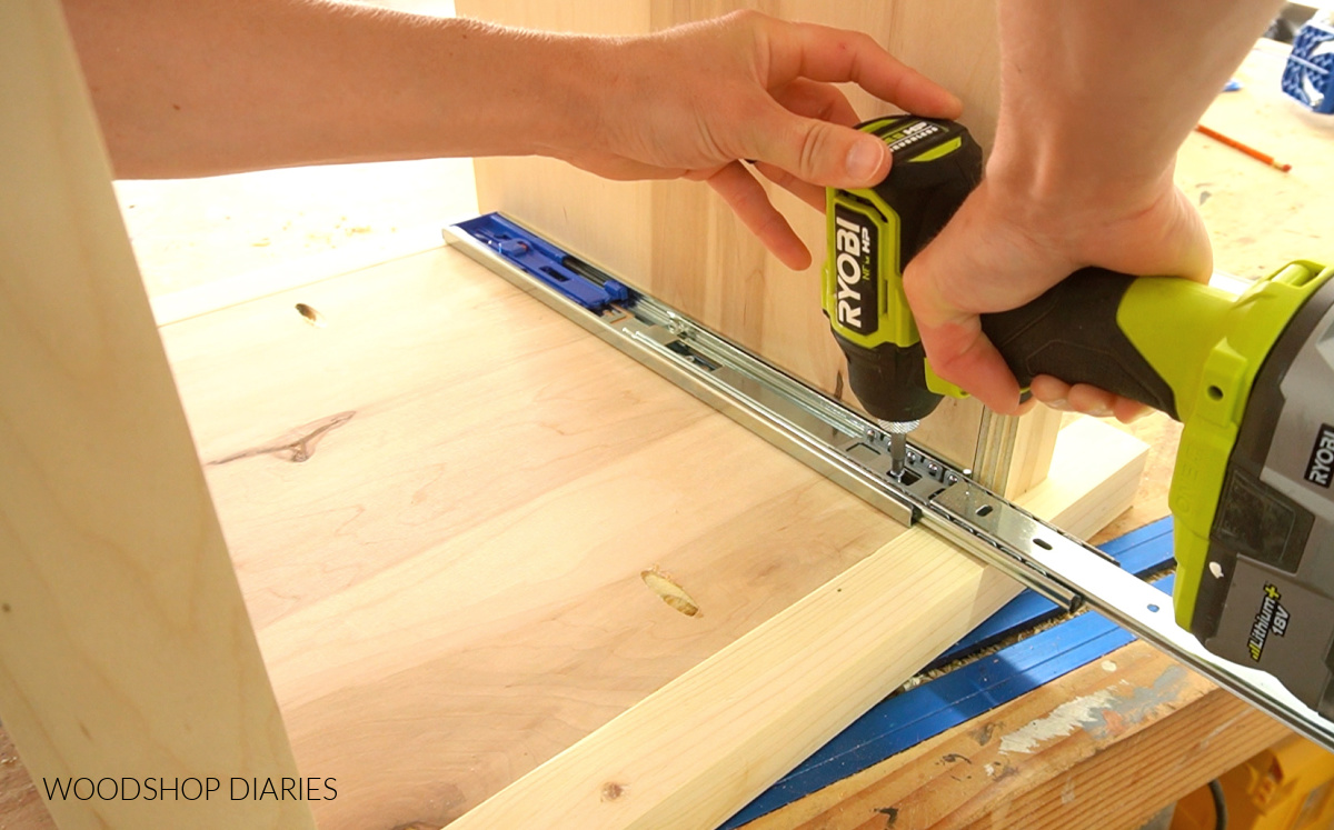 Close up of driving screw to install drawer slide