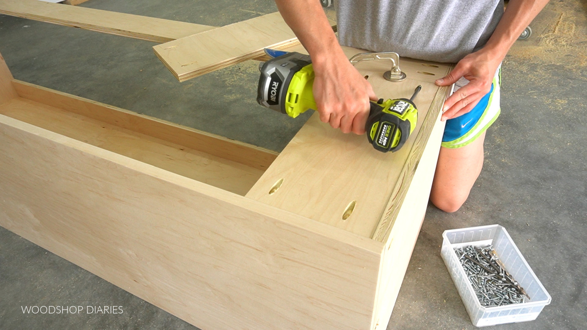 Shara Woodshop Diaries installing side top supports into built in bench box frame