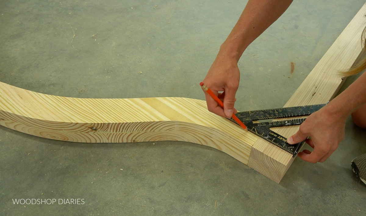 Using a square to mark dowel locations to assemble bed frame head board