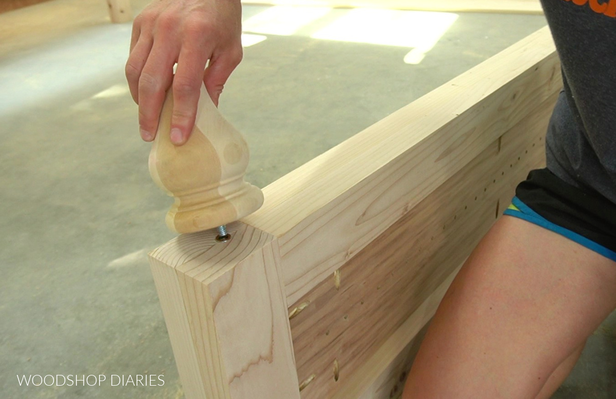 Shara Woodshop Diaries screwing furniture foot into footboard of bed into threaded inserts