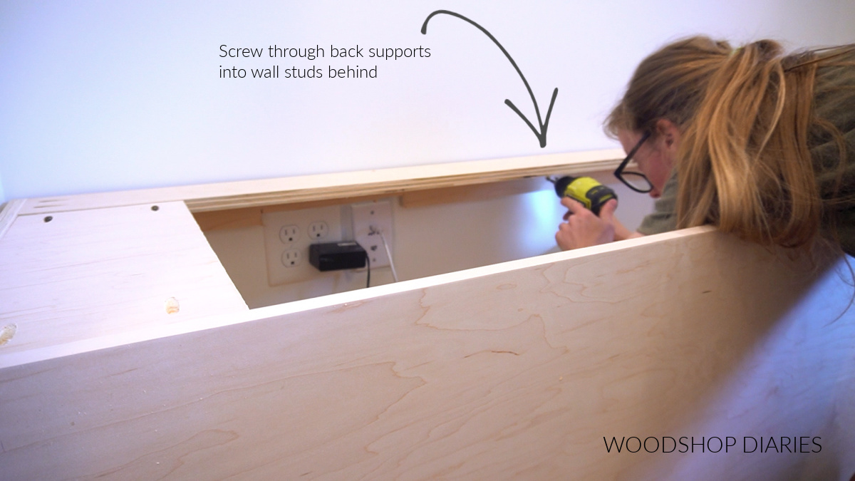 Shara Woodshop Diaries securing built in bench box to wall studs
