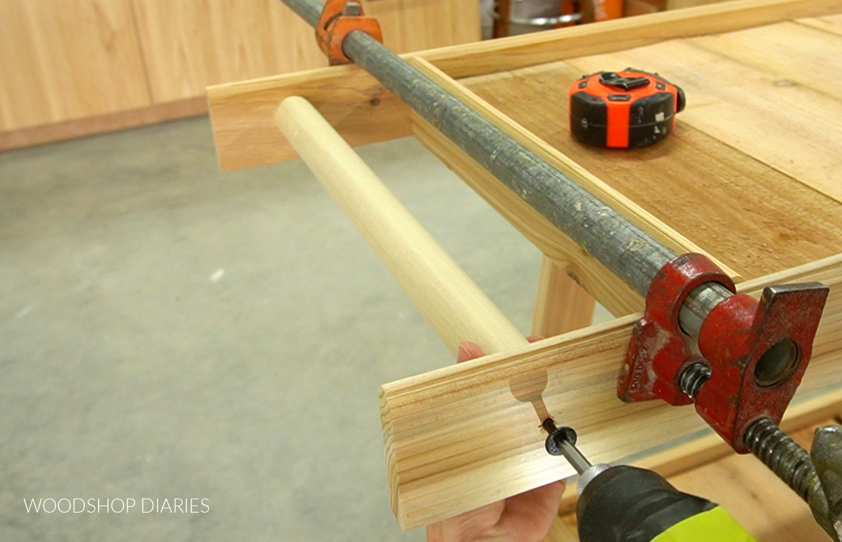 Driving timber screw to attach cart handle