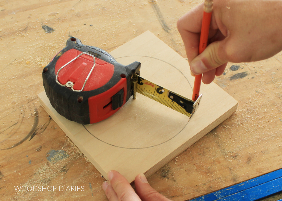 Using a tape measure to draw a circle on a piece of wood