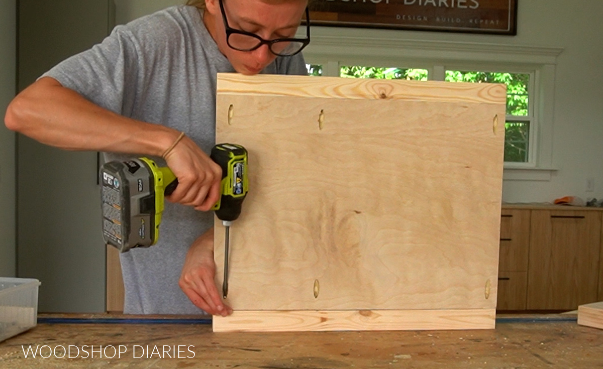 Shara Woodshop Diaries assembling side panels of DIY one drawer nightstand