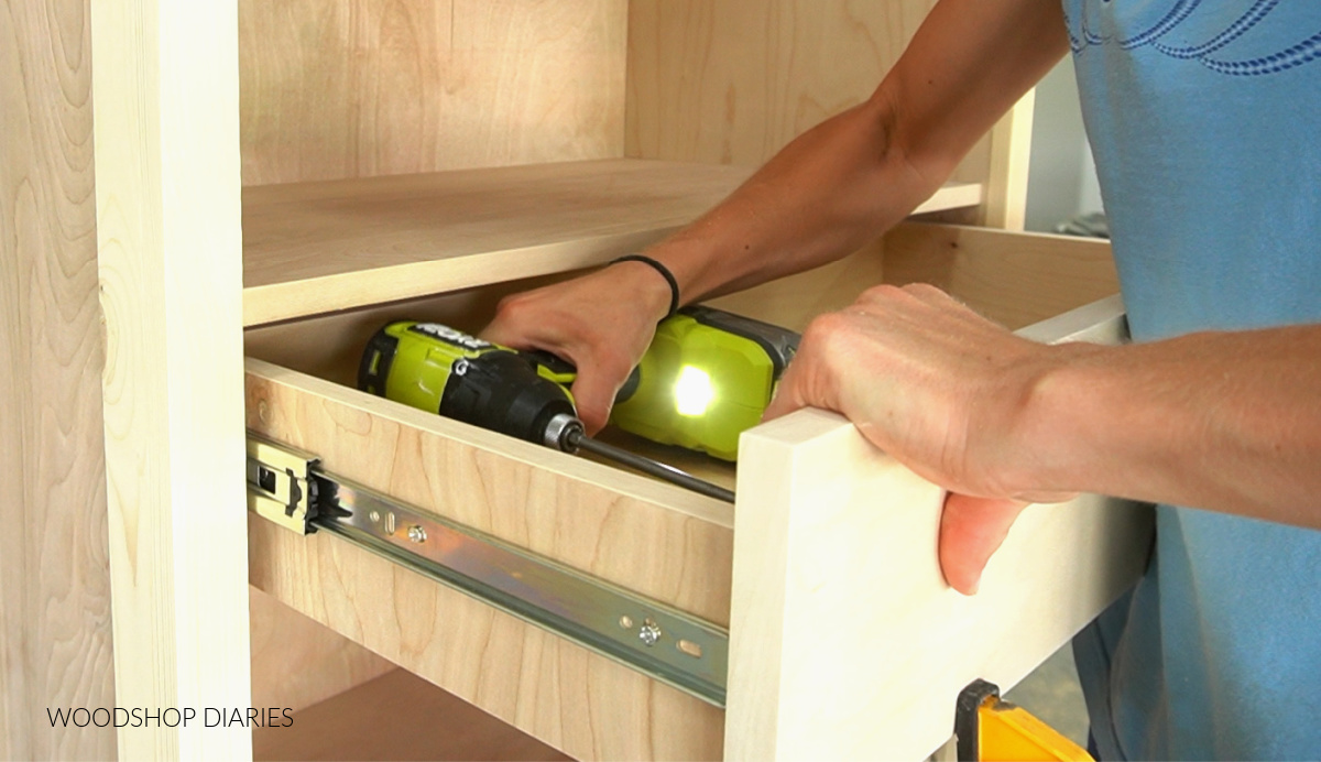 Shara Woodshop Diaries securing drawer fronts onto drawer boxes in bookshelf