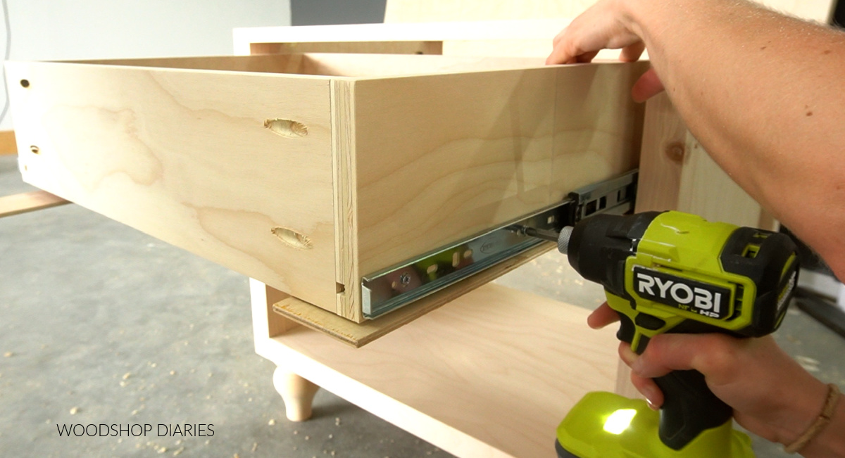 Installing drawer box into drawer slides in nightstand