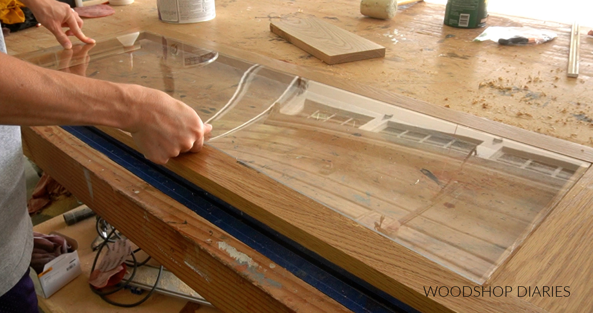 Installing plexiglass panels in rabbets on back side of display cabinet doors