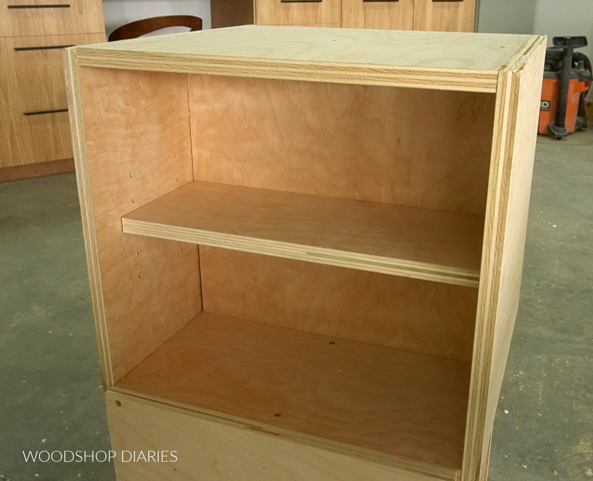 Shelves installed in cubbies of charging station box