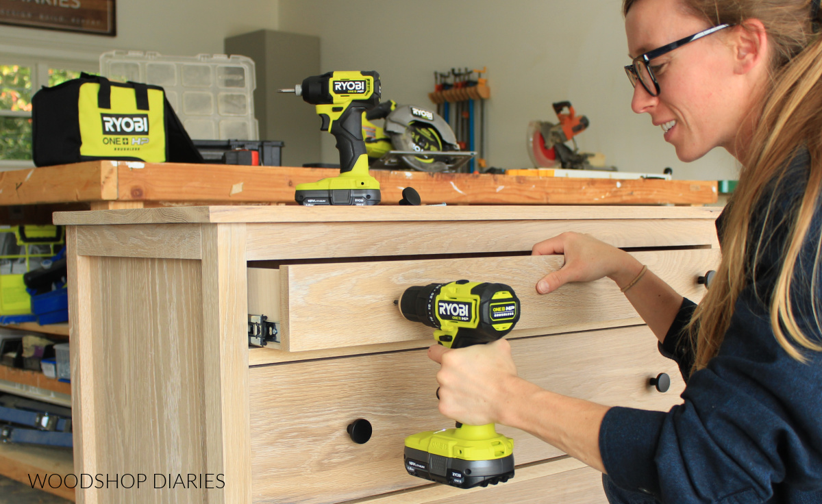 Shara Woodshop Diaries using Ryobi HP drill to drill knob holes on dresser