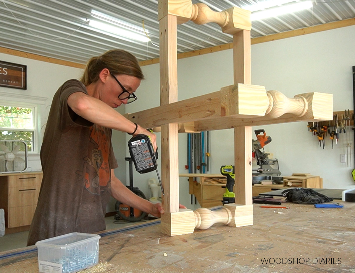 Shara Woodshop Diaries assembling DIY coffee table base on workbench