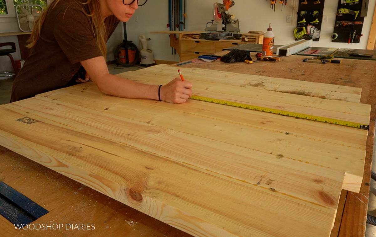 Shara Woodshop Diaries marking center of table top glued up panel