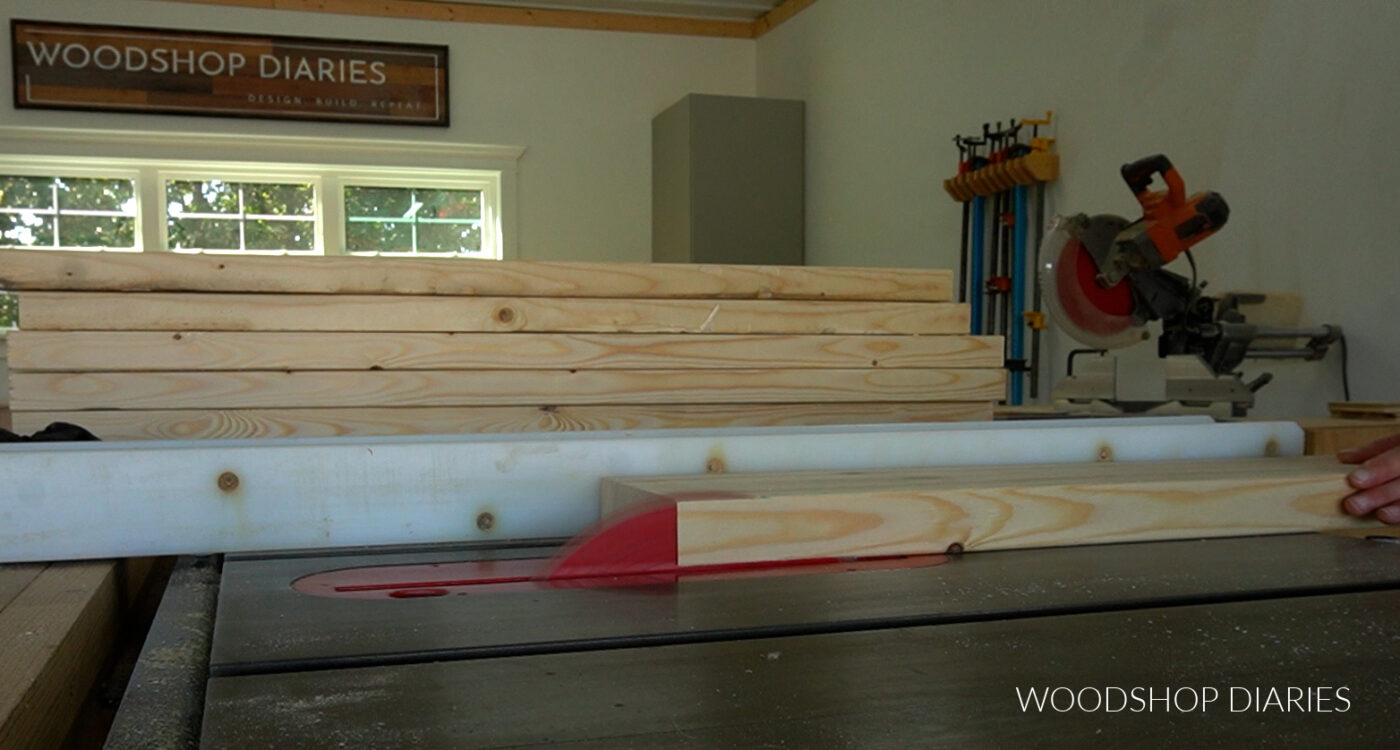 Running boards through table saw to square off rounded edges