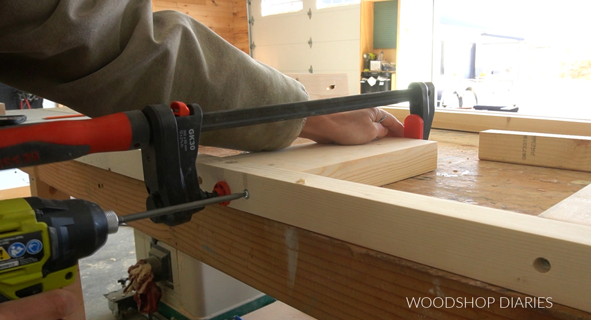 Shara Woodshop Diaries clamping and attaching shelf slat using screws