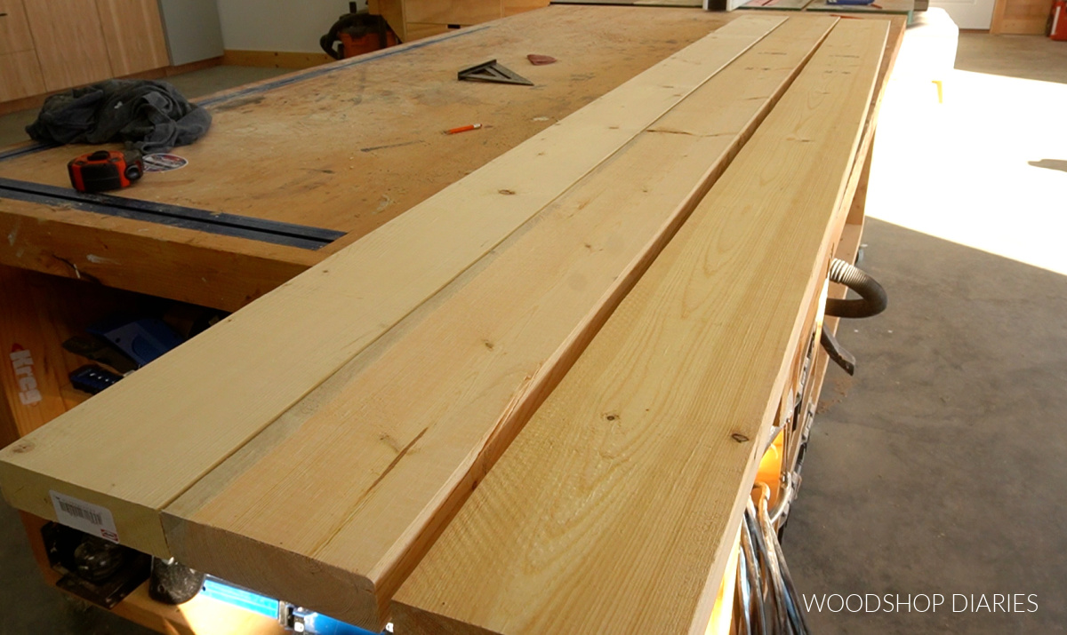 construction lumber laid out on workbench