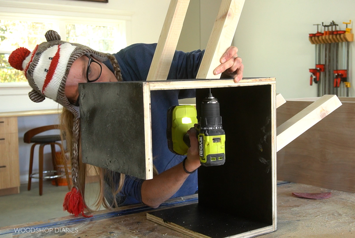 Predrilling holes to install shelf legs