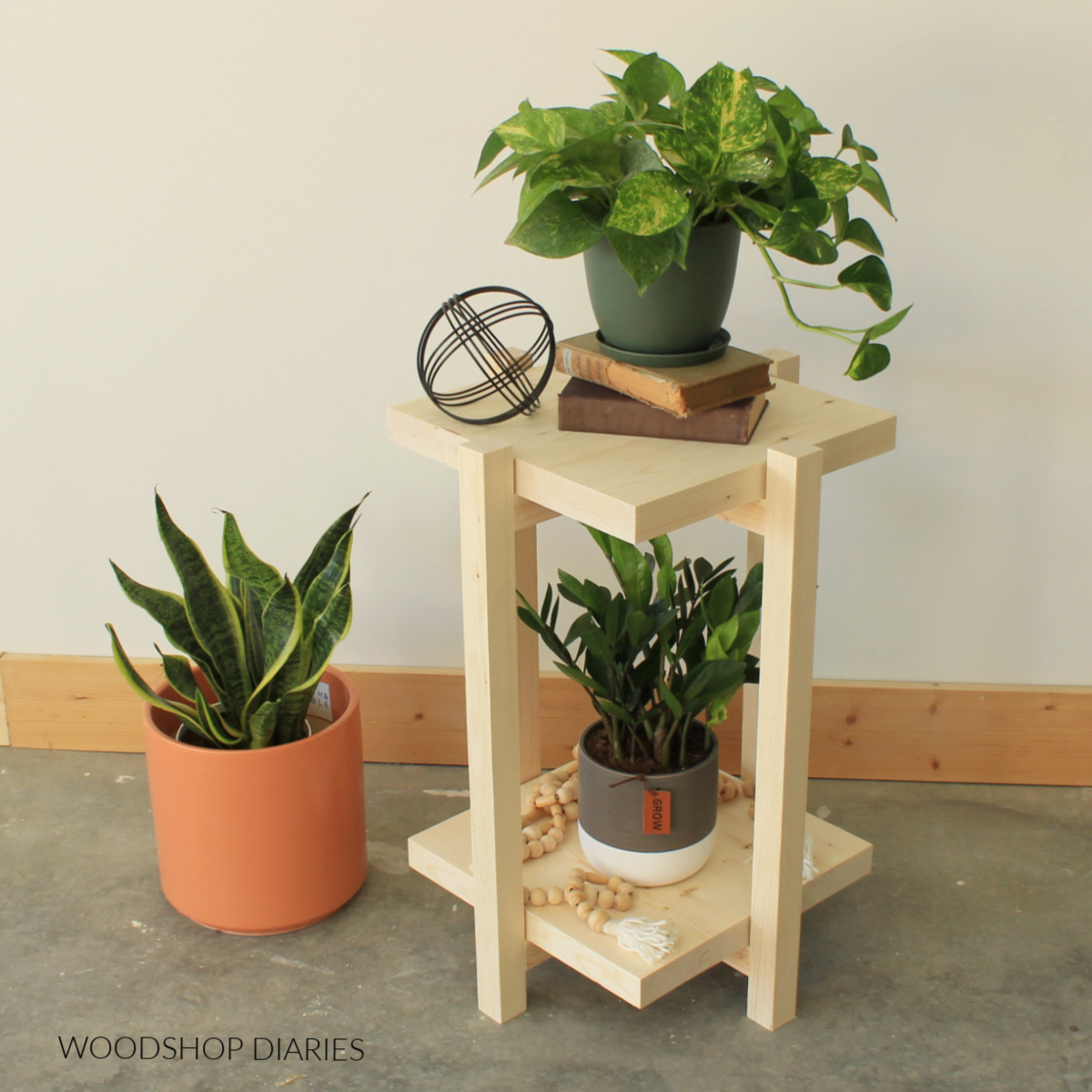 Plants on display on completed end table/plant stand
