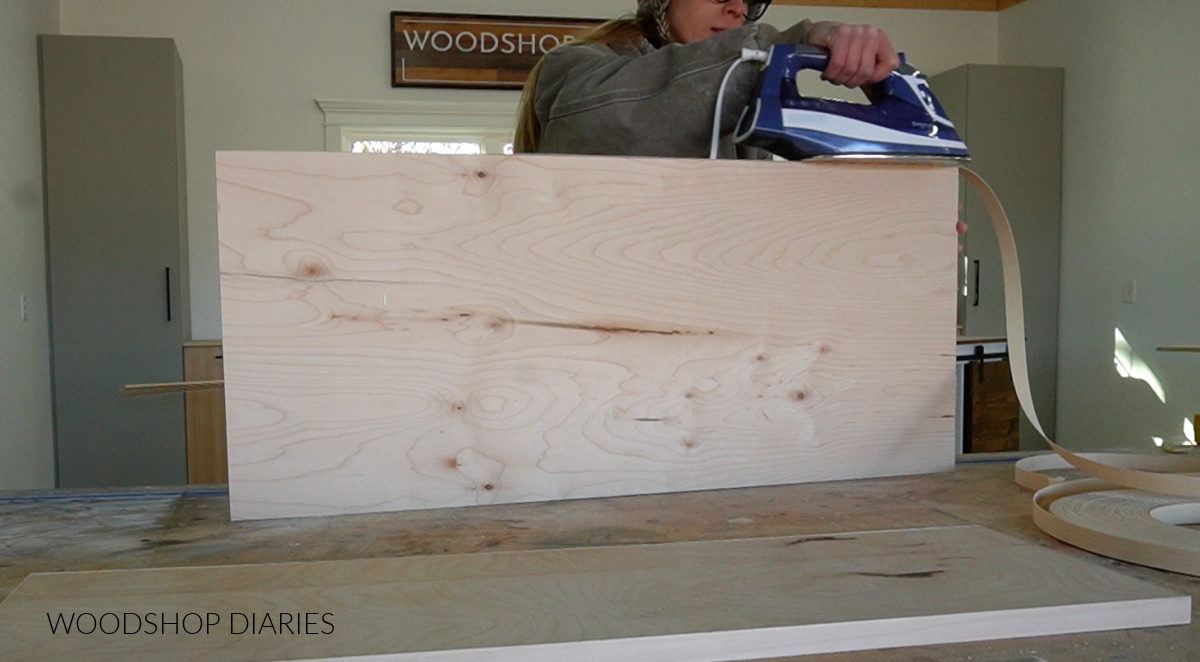 Shara Woodshop Diaries applying iron on edge banding to top bench seat panel