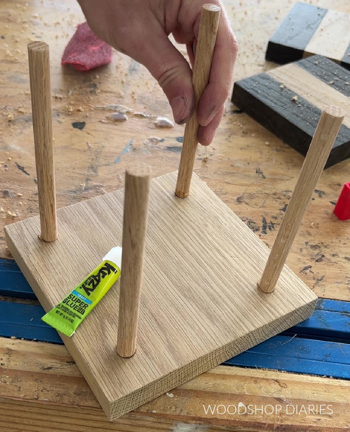Gluing dowels into coaster holder stand