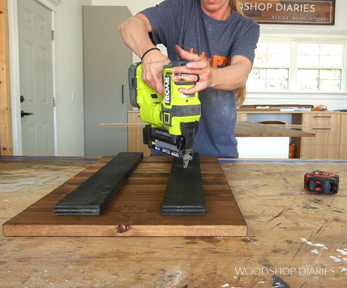 Shara Woodshop Diaries nailing slats onto back side of sliding wood doors 