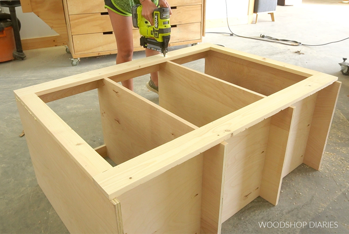 Shara Woodshop Diaries nailing face frame onto front of cabinet