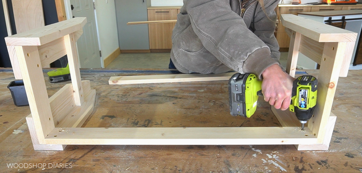 Building simple bench frame securing top support between side frames